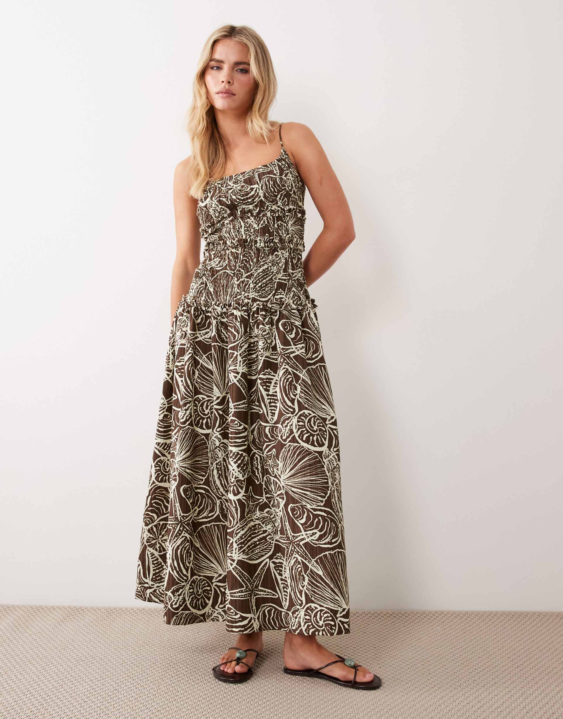 asos design petite crinkle maxi dress with shirred dropped waist in chocolate shell print