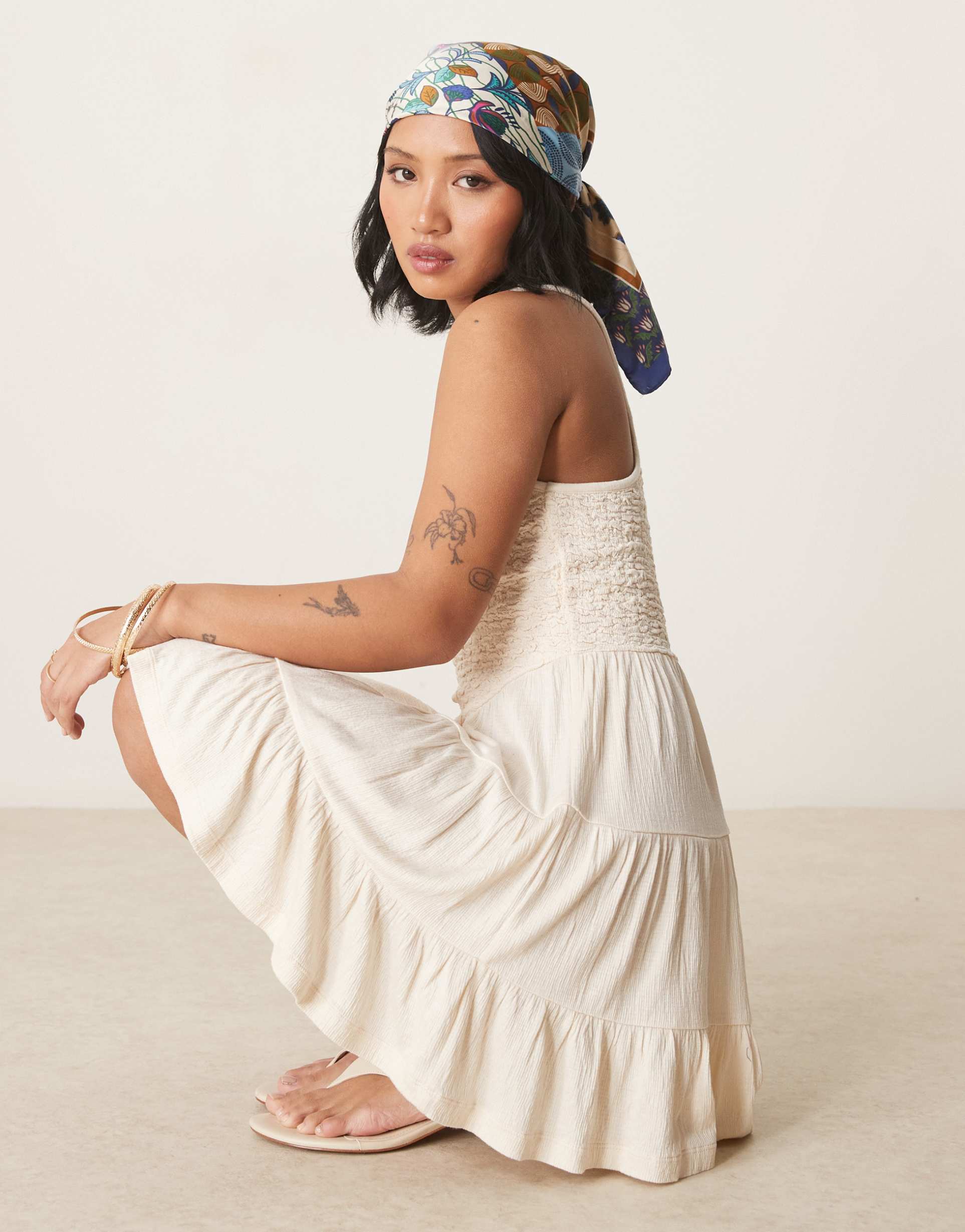 asos design petite crinkle scoop tiered mini dress in cream