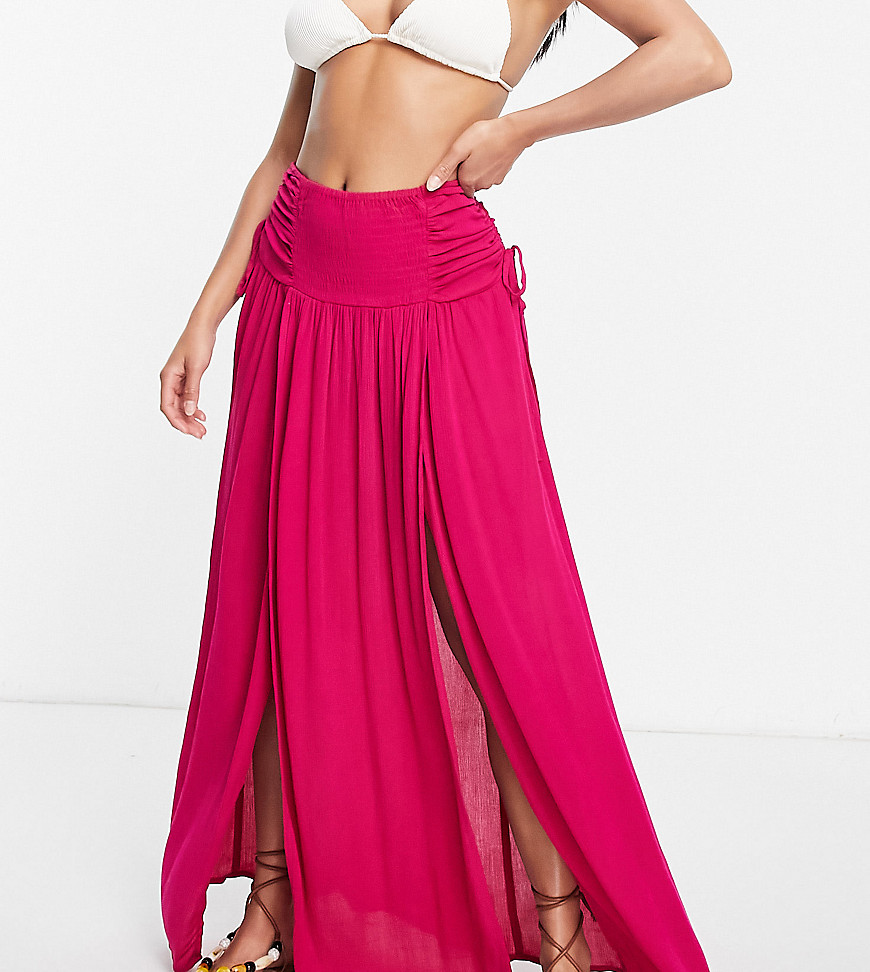 ASOS DESIGN Petite crinkle shirred waist maxi skirt with ruched sides in hot pink