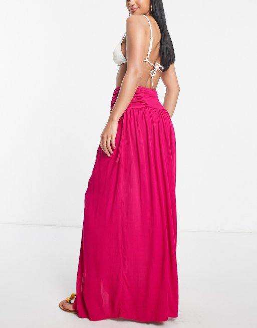 ASOS DESIGN Petite crinkle shirred waist maxi skirt with ruched sides in hot pink