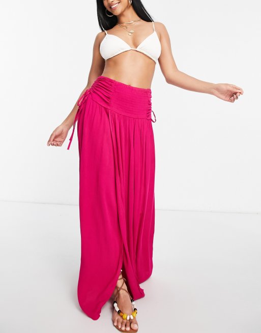 ASOS DESIGN Petite crinkle shirred waist maxi skirt with ruched sides in hot pink