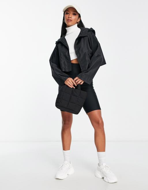 Nike classic padded tape jacket with hood in black, ASOS