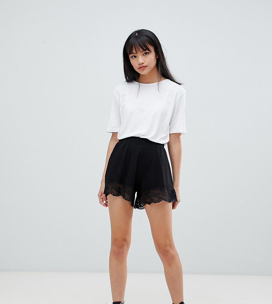 ASOS DESIGN Petite culotte shorts with lace hem-Black