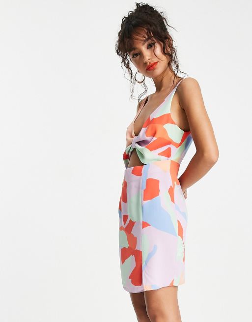 ASOS DESIGN Petite cut out knot front mini dress in bright abstract print