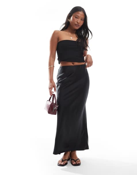 ASOS DESIGN Petite satin bias midi skirt in black