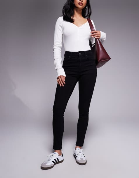 ASOS DESIGN Petite skinny jeans in black 