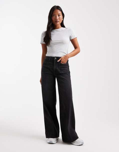 ASOS DESIGN Petite high waist wide leg jeans with front pockets in black 