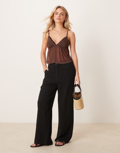 ASOS DESIGN Petite relaxed straight leg trousers with linen in black