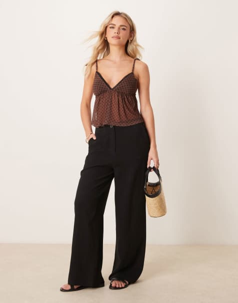 ASOS DESIGN Petite relaxed straight leg trousers with linen in black
