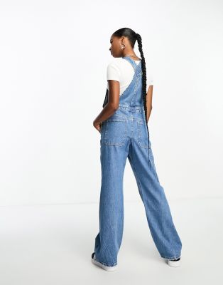 ASOS DESIGN Petite denim overalls in mid blue