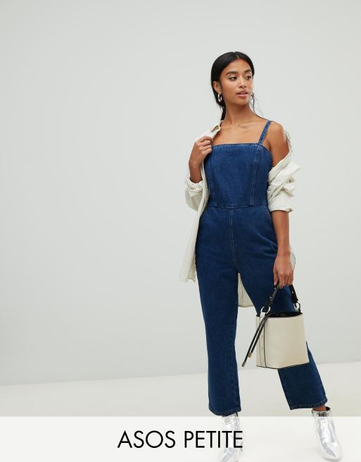 ASOS DESIGN PETITE denim jumpsuit with strappy back in midwash blue