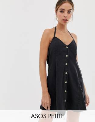 ASOS DESIGN Petite  Czarna sprana sukienka mini z denimu z dekoltem typu halter i guzikami-Czarny W kolorze spranej czerni