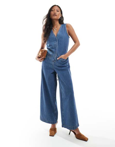 ASOS DESIGN Petite denim sleeveless loose jumpsuit in midwash blue - view 1