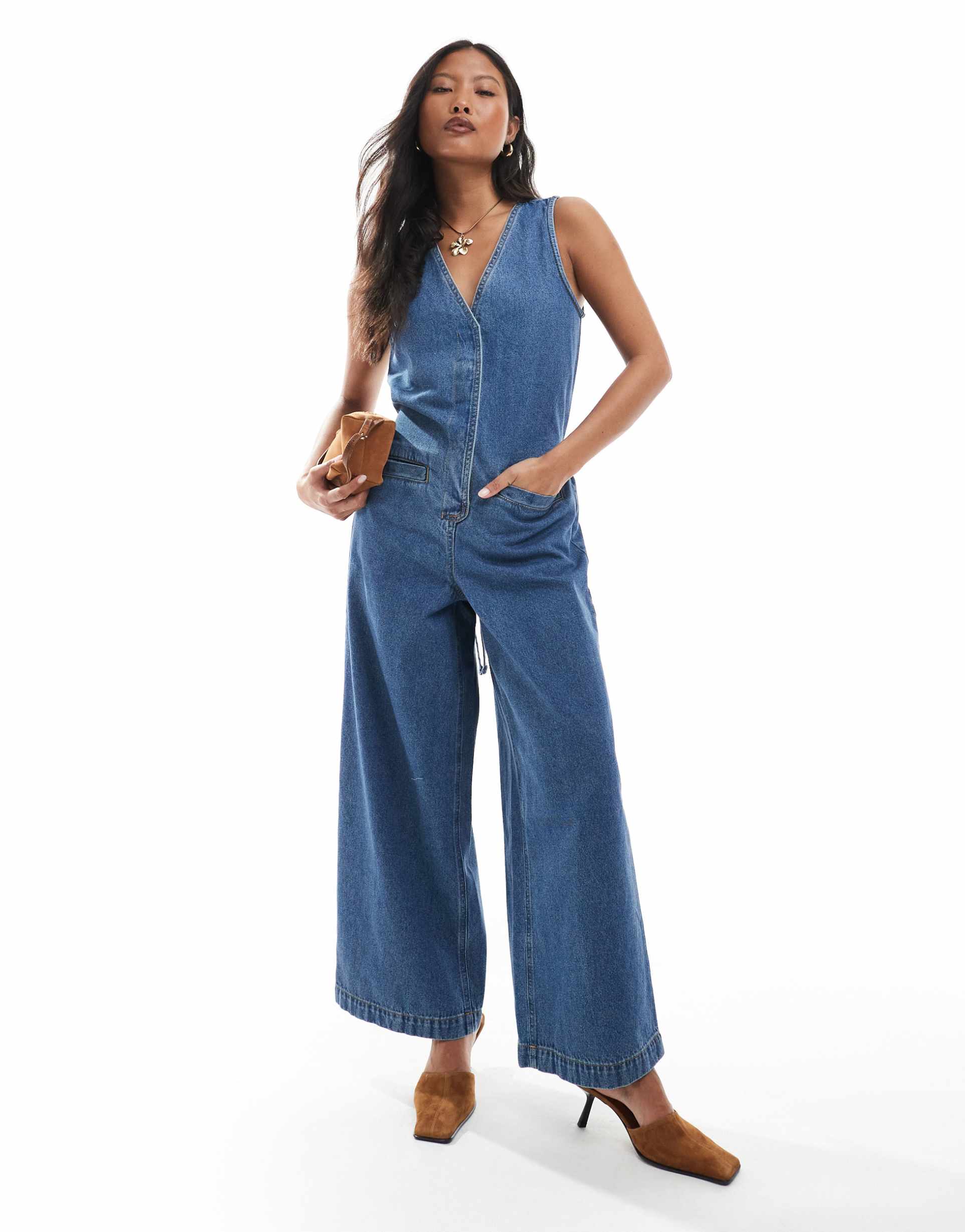 asos design petite denim sleeveless loose jumpsuit in midwash blue