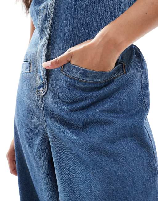 ASOS DESIGN Petite denim sleeveless loose jumpsuit in midwash blue, 3 of 4