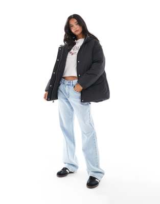 ASOS DESIGN Petite - Doudoune oversize à capuche - Noir