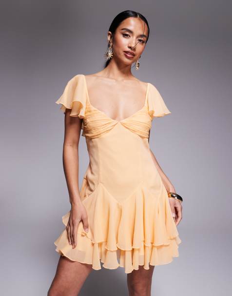ASOS DESIGN Petite dropped waist full skirt mini dress in pale orange - view 1