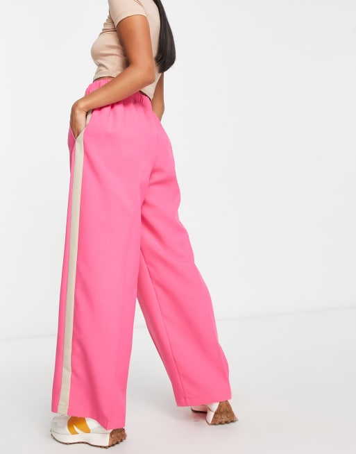 ASOS DESIGN Petite elastic waist side stripe pants in pink with