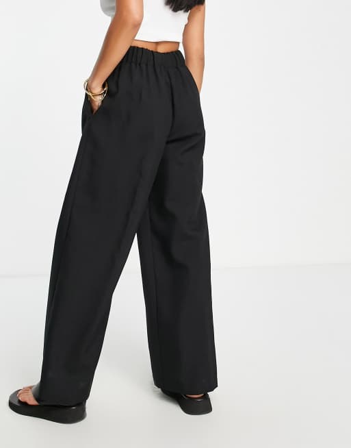 ASOS DESIGN elastic waist tailored pants in black