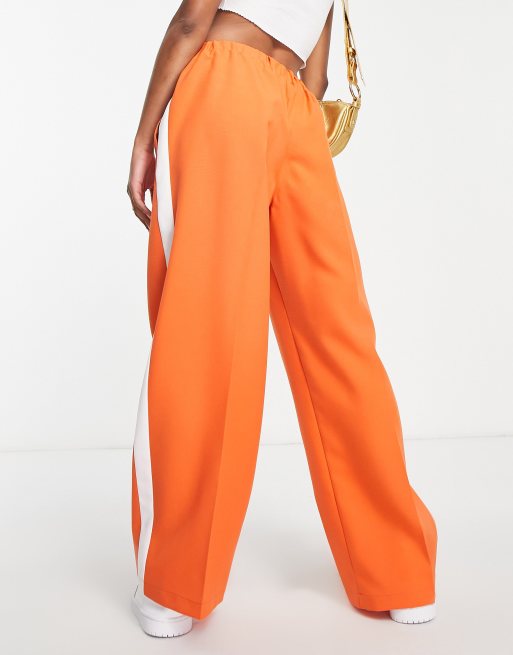 ASOS DESIGN Petite elastic waist tailored trouser in amber with ivory side  stripe