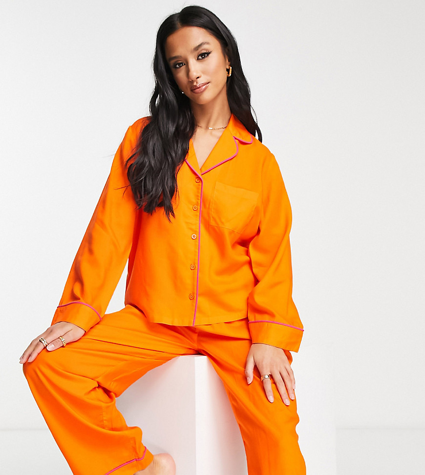 ASOS DESIGN Petite exclusive modal shirt & pants pajama set with contrast piping in orange-Black