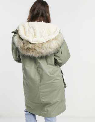 green fur lined parka