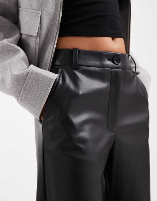 ASOS DESIGN Petite faux leather straight leg pants in black
