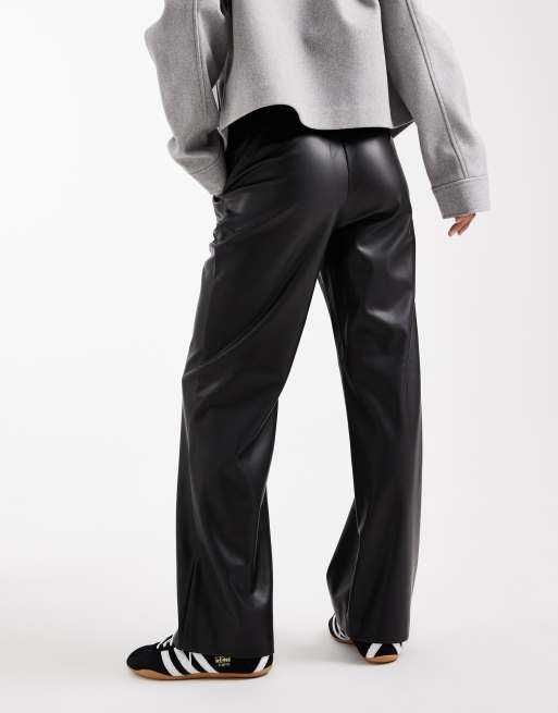 ASOS DESIGN Petite faux leather straight leg pants in black