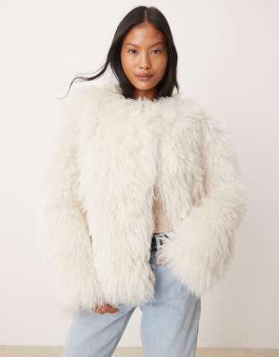 ASOS Petite ASOS DESIGN Petite faux mongolian fur jacket in cream-White