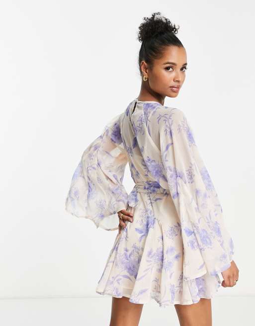 ASOS DESIGN Petite flare skater mini dress with flared sleeves in blue  floral | ASOS