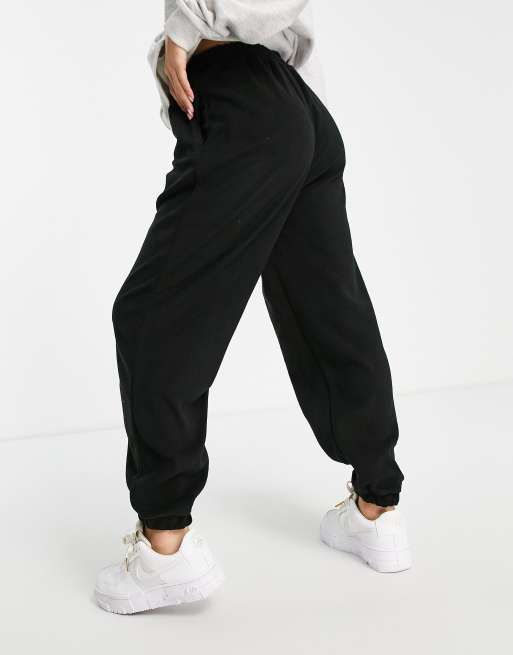 ASOS DESIGN Petite fleece sweatpants in black