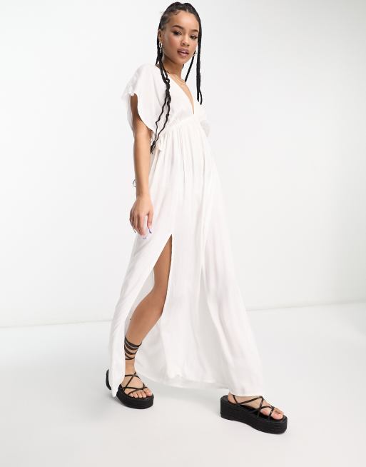 ASOS DESIGN Petite flutter sleeve maxi beach dress with channeled tie waist  in white | ASOS