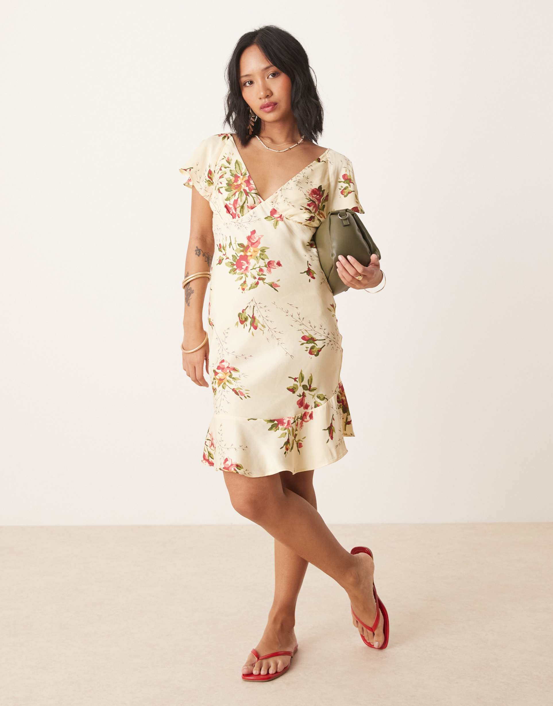 asos design petite flutter sleeve mini dress in floral print