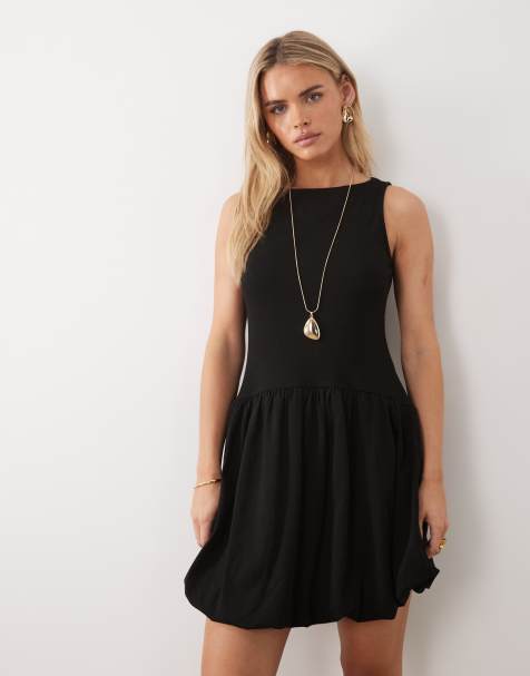 ASOS DESIGN Petite - Geribbelde mouwloze mini jurk met pofzoom in zwart - view 1
