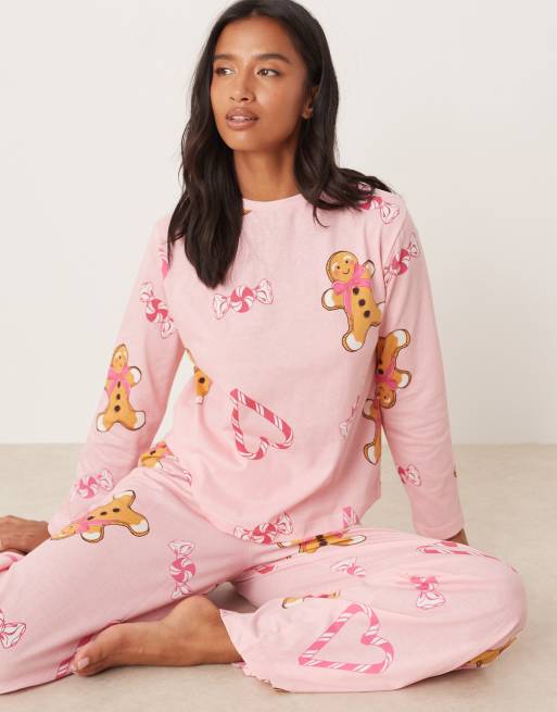 ASOS DESIGN Petite gingerbread & candy cane long sleeve top & pants pyjama set in pink marl