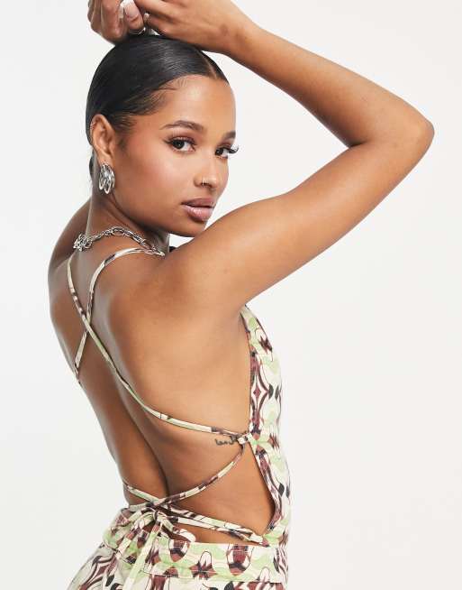 ASOS DESIGN Petite halterneck jumpsuit with flare leg in geo print, 3 of 4