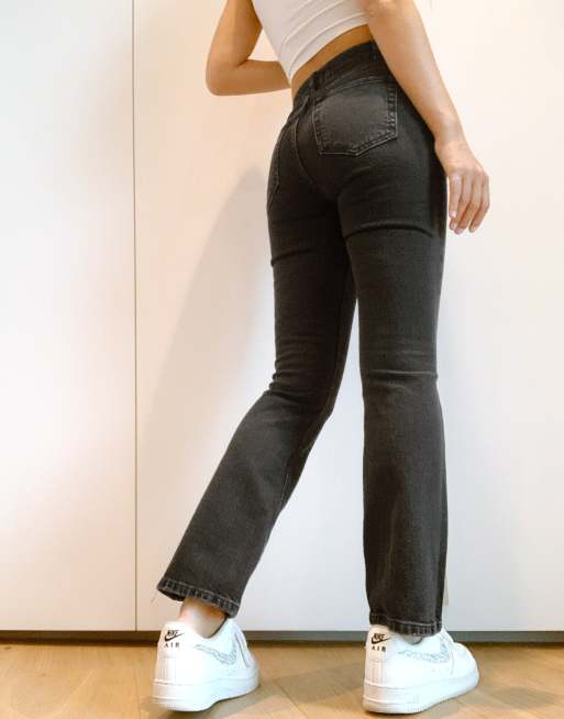 ASOS DESIGN Petite high-rise 70s kick flare jeans in washed black, 2 of 4