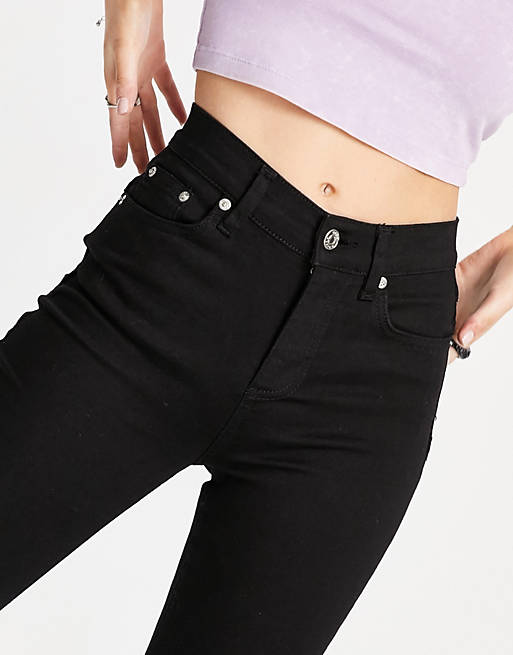 Women Petite high rise 'lift and contour' flare jeans in clean black 
