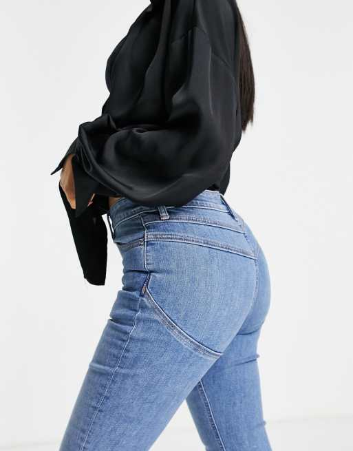 ASOS DESIGN Petite high rise 'lift and contour' stretch flare jeans in bright blue, 3 of 4