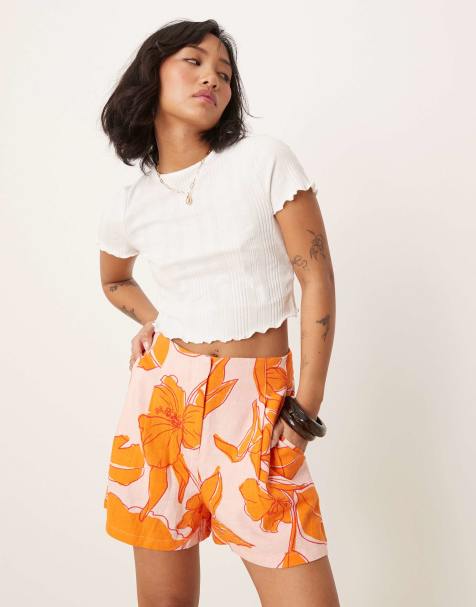 ASOS DESIGN Petite high rise seam detail tailored shorts with linen in palm print - view 1