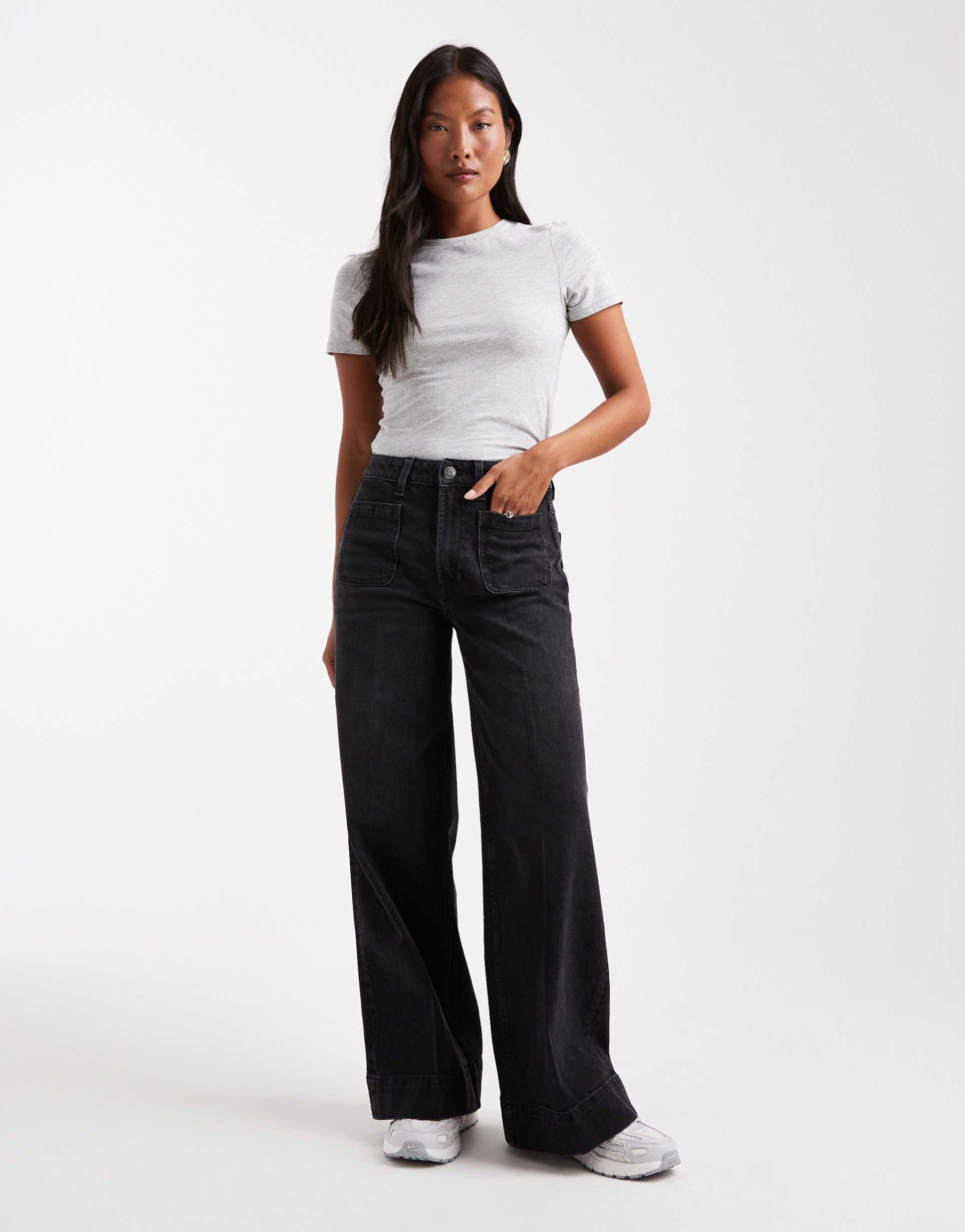 asos design petite high rise wide leg jeans with front pockets in black