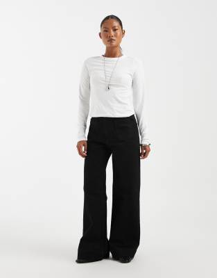Asos Petite Asos Design Petite High Rise Wide Leg Jeans With Front Pockets In Black