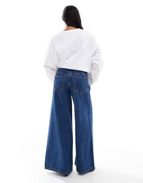 ASOS DESIGN Petite high waist wide leg jeans in midwash blue - view 1