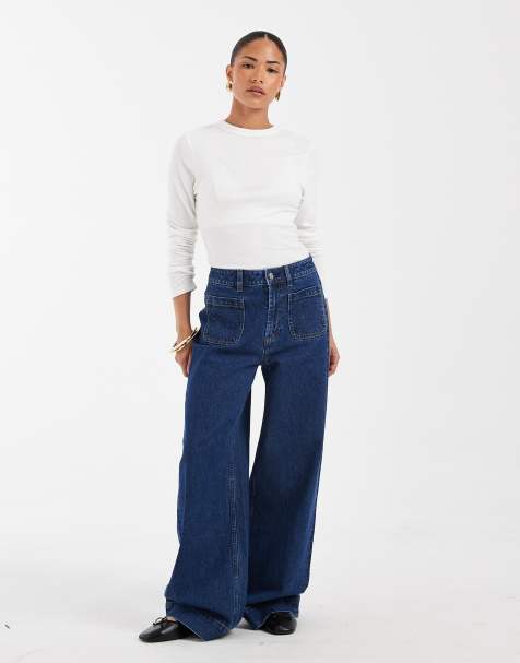 ASOS DESIGN Petite high waist wide leg jeans with front pockets in dark wash blue - view 1
