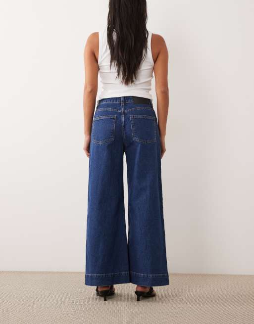 ASOS DESIGN Petite high waist wide leg jeans with front pockets in dark wash blue, 3 of 5