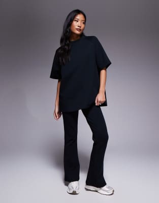 interlock flared sweatpants in black - part of a set