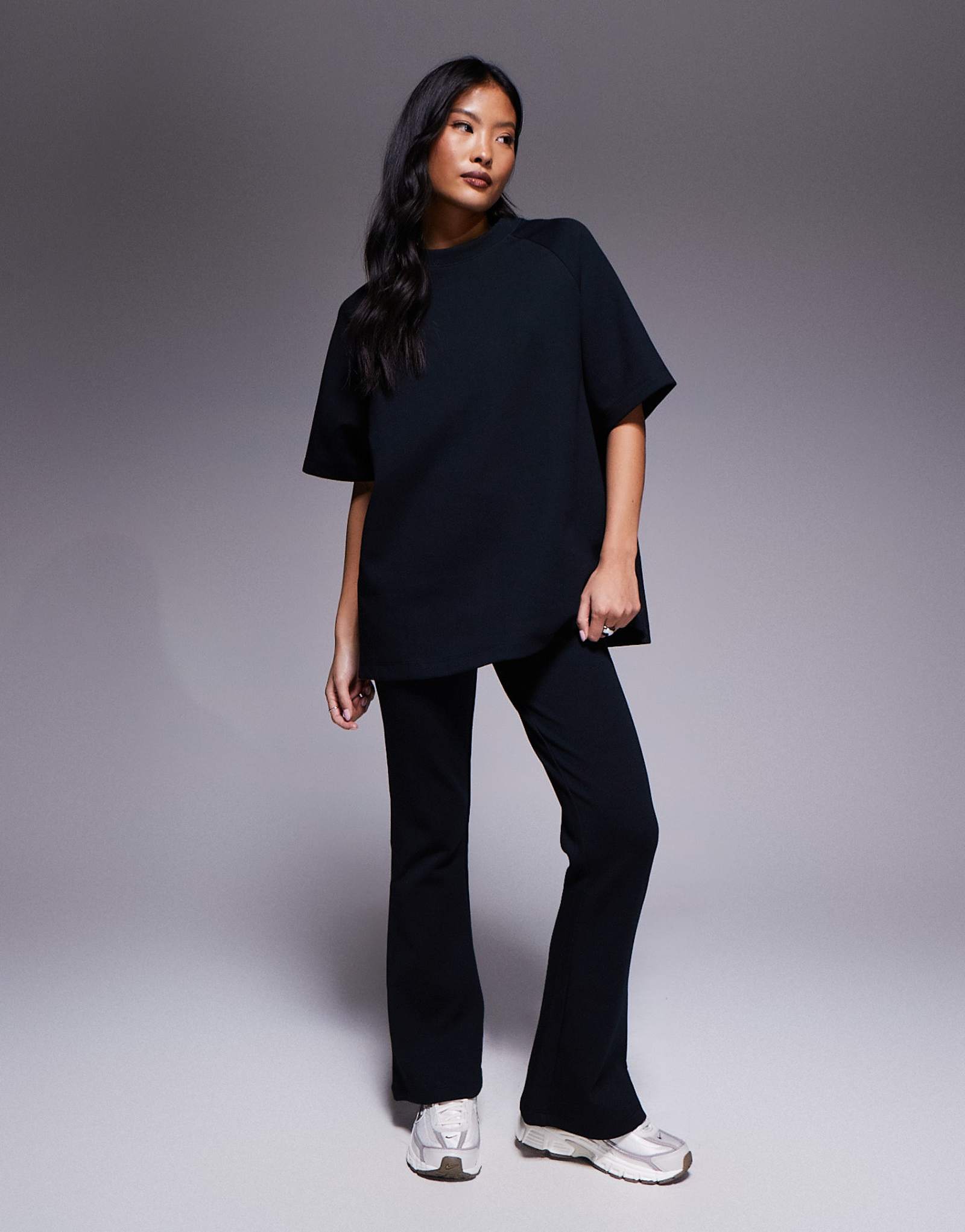 Расклешенные спортивные брюки-клеш черного цвета от ASOS DESIGN Petite interlock - часть комплекта