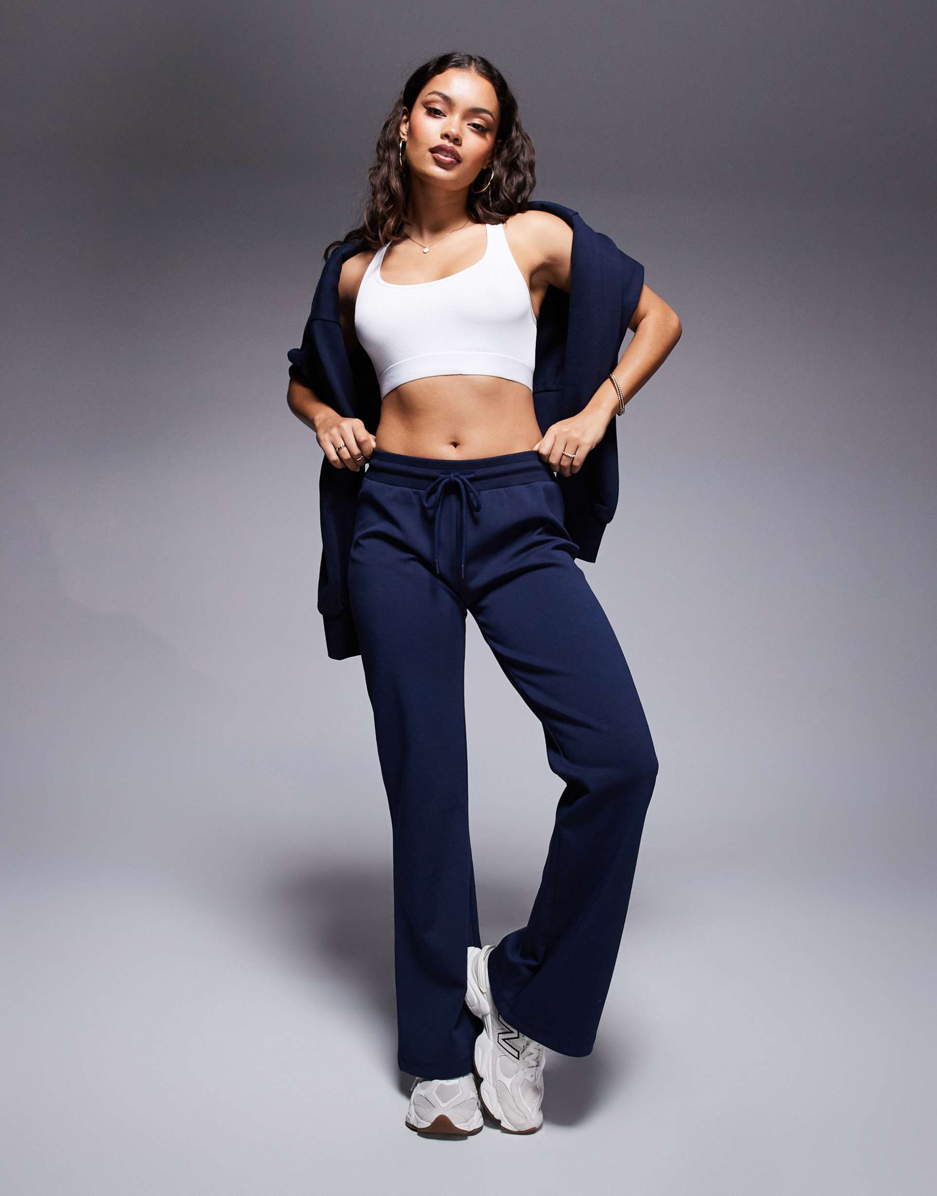 asos design petite interlock flared sweatpants in navy