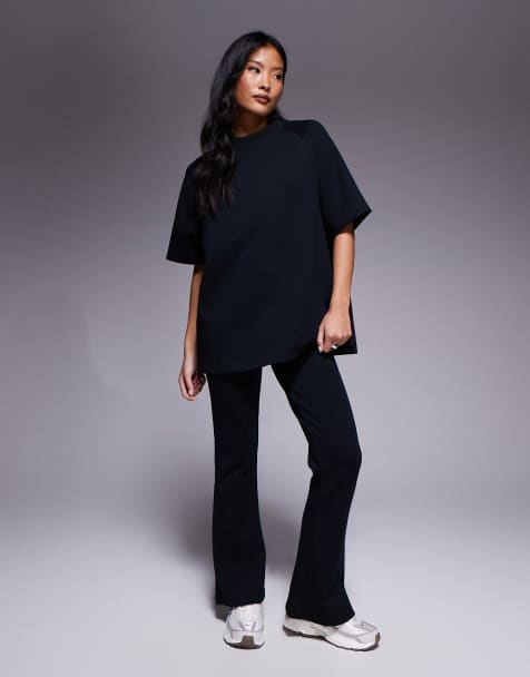 ASOS DESIGN Petite interlock flared trackies in black (part of a set) - view 1