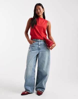 ASOS DESIGN Petite - Jean bouffant à taille haute - Bleu vintage pâle W34 L28